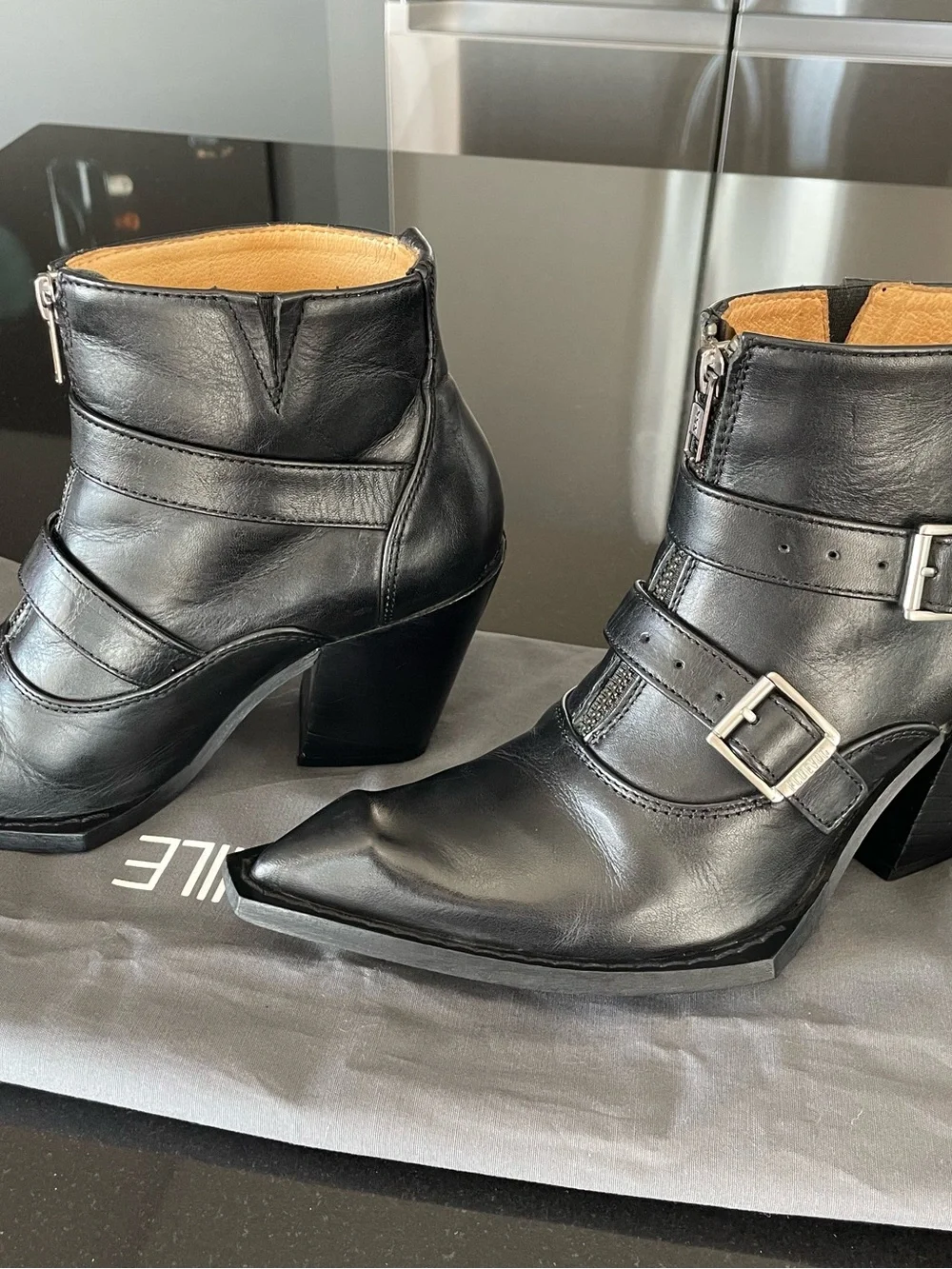 John Fluevog, black swordfish buckle/zip boot. Size 7.